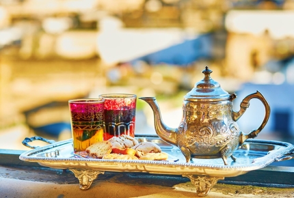 Enjoy a cup of Moroccan mint tea and sweets in Marrakech