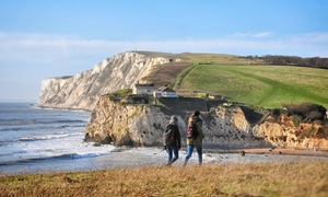 Fresh Start Walking Weekend, Isle of Wight. Two walks stroll on a path near the coast.